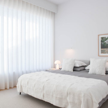 White Bedroom with Curtains and Pale Bedding