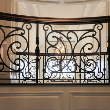 Project #74 | Circular Staircase with Hand-Forged Metal Panels