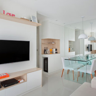 Immagine di un piccolo soggiorno minimalista con pareti bianche e pavimento in gres porcellanato