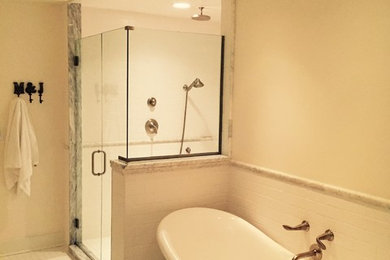 Example of a mid-sized transitional master white tile and subway tile ceramic tile bathroom design in Other with an undermount sink, shaker cabinets, white cabinets, marble countertops, a two-piece toilet and white walls