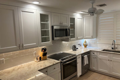 Example of a beach style kitchen design in Miami