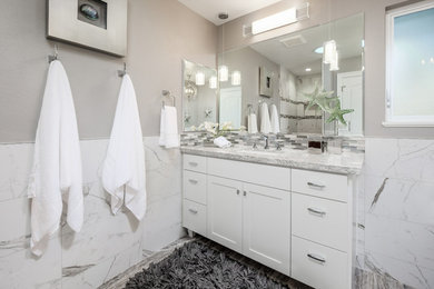 Mid-sized modern master bathroom in Sacramento with shaker cabinets, white cabinets, a freestanding tub, an open shower, a one-piece toilet, gray tile, ceramic tile, grey walls, travertine floors, an undermount sink, engineered quartz benchtops, grey floor and an open shower.
