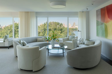 Example of a mid-sized trendy open concept living room design in New York with white walls