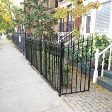 Wicker Park Rust removal and painting wrought iron fence.