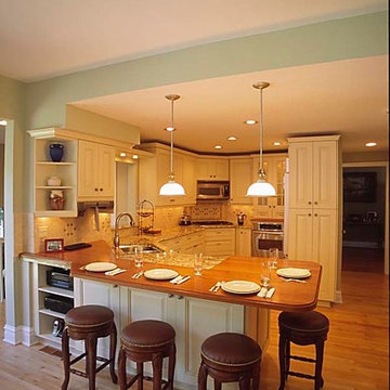 Traditional Cream Kitchen with Wood Eating Counter in Glencoe