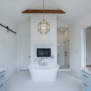 Clean & Modern White Farmhouse on E. 10th St.