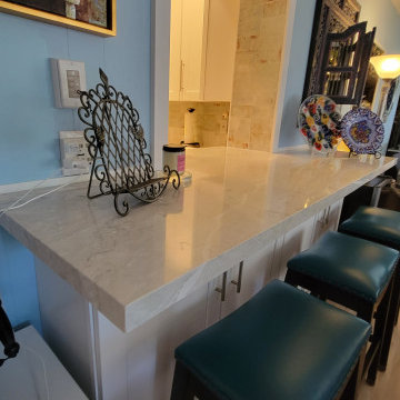 Small white shaker kitchen with coffee bar