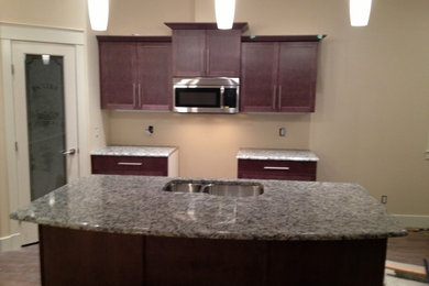 Elegant kitchen photo in Vancouver