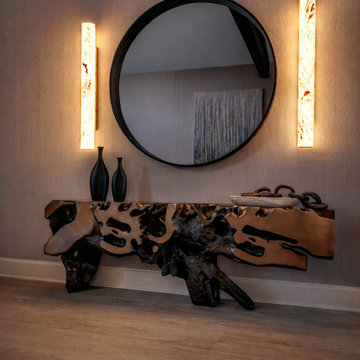 Luxury Entryway Console with Round Mirror and Statement Wall Sconces