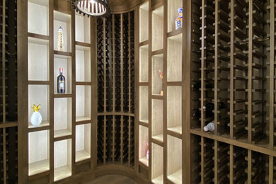 Beach style wine cellar photo in Other