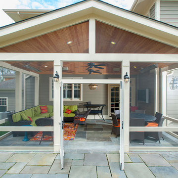 Screened porch with flagstone patio in Bethesda
