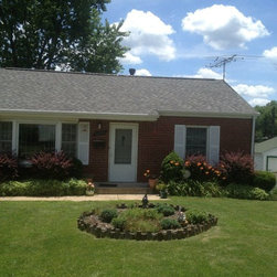 Storm Restoration St. Ann - Roofing And Gutters
