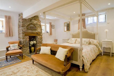 This is an example of an arts and crafts bedroom in Surrey.