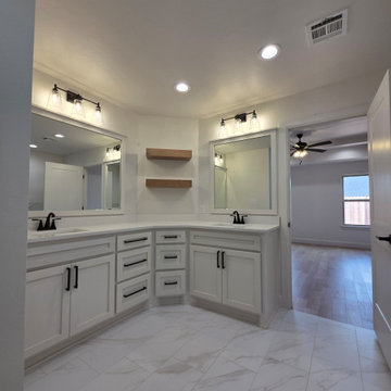 Primary/Master Bathroom double vanity & floating shelves