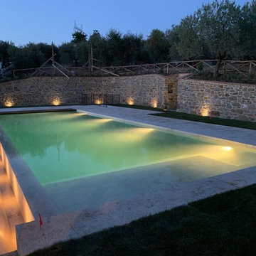 Piscina a sfioro in Travertino - Panicale