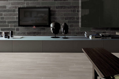 Large trendy open concept porcelain tile living room photo in Toronto with gray walls, a tile fireplace and a wall-mounted tv