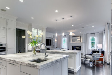 Eat-in kitchen - traditional eat-in kitchen idea in Boston with an undermount sink and two islands