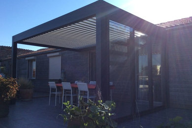 Idées déco pour une véranda campagne.