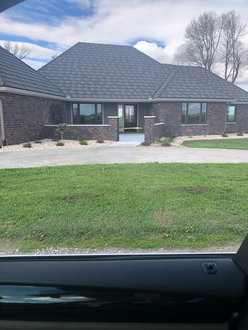 Lighting the front of the house with wafer lights.