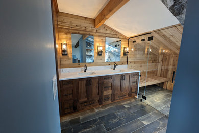 Inspiration for a mid-sized modern master blue tile and porcelain tile porcelain tile, black floor, double-sink, exposed beam and wood wall bathroom remodel in Seattle with shaker cabinets, medium tone wood cabinets, a bidet, blue walls, an undermount sink, quartz countertops, a hinged shower door, white countertops and a built-in vanity