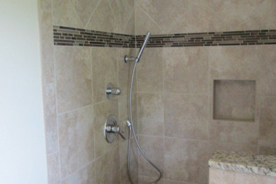 Mid-sized trendy master beige tile and ceramic tile ceramic tile alcove shower photo in Other with an undermount sink, recessed-panel cabinets, white cabinets, granite countertops and beige walls