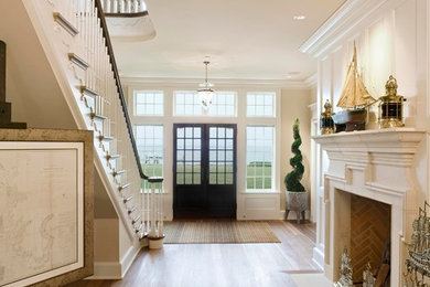 Inspiration for a traditional entryway in DC Metro with a dark wood front door.