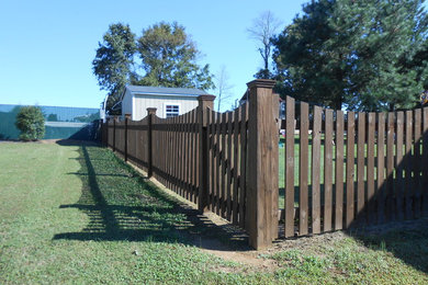 Design ideas for a huge traditional full sun backyard landscaping in Other.