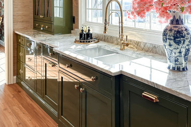 Eat-in kitchen - eclectic galley eat-in kitchen idea in Other with an undermount sink, beaded inset cabinets, green cabinets, quartzite countertops, white backsplash, an island and white countertops
