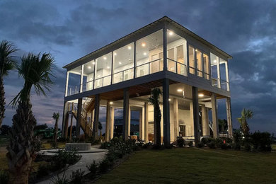 Example of a beach style exterior home design in New Orleans