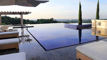 Sleek Wooden Deck Flows into Pool