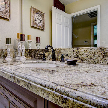 Sage and Amaretto Granite Vanity, Tub, & Shower