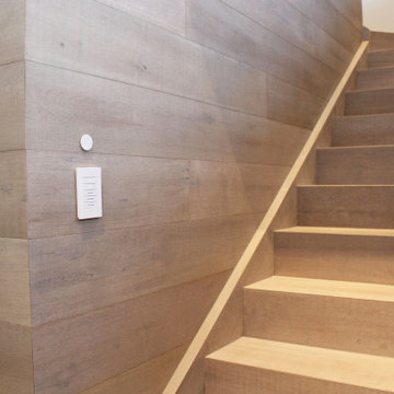 Cocoplum Estate - Crestron Keypad Staircase Wood Wall
