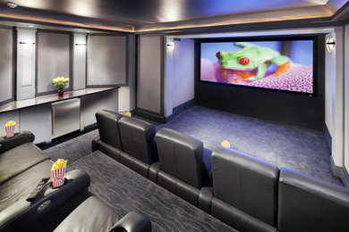 Inspiration for a mid-sized contemporary enclosed home theatre in New York with grey walls, carpet and a projector screen.