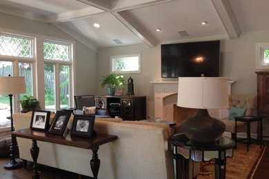 Mid-sized elegant dark wood floor family room photo in Chicago with a wall-mounted tv