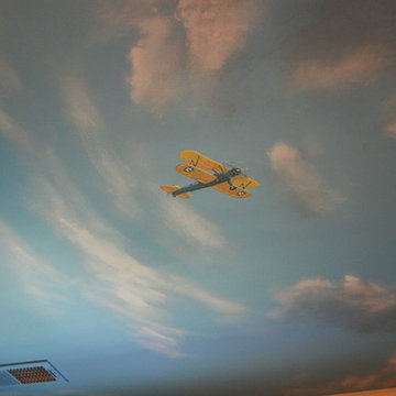 Aviation/Planes Themed Mural by Tom Taylor of Wow Effects, for a boy's bedroom.