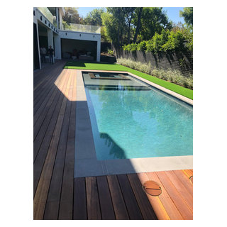 Brand New Modern Pool Construction, Turf, and Wood Deck for a home in ...