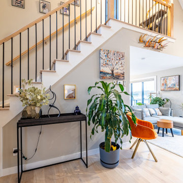Open Staircase with Modern Railing and Light-Filled Entry – Cape Ann MA