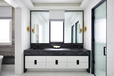 Example of a large trendy master single-sink and wallpaper bathroom design in Toronto with white cabinets, white walls, an integrated sink, marble countertops, a hinged shower door, gray countertops and a built-in vanity
