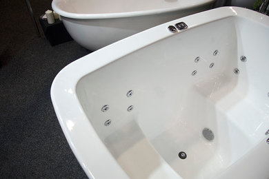 This is an example of a contemporary bathroom in Melbourne with a freestanding bath.