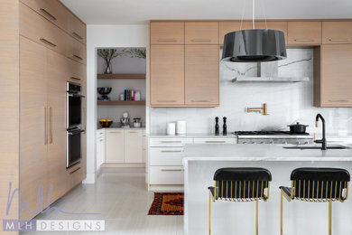 Inspiration for a contemporary porcelain tile and beige floor kitchen remodel in Little Rock with a single-bowl sink, flat-panel cabinets, light wood cabinets, quartzite countertops, white backsplash, stone slab backsplash, paneled appliances, an island and white countertops