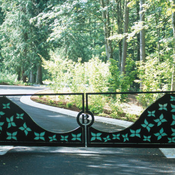 Decorative entry gate at private roadway...Dogwood blossom motif