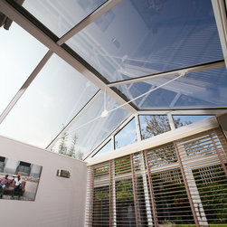 White Conservatory with PVCu Bi-Fold Doors - Products