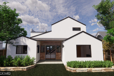 Inspiration for a large contemporary exterior home remodel in Dallas