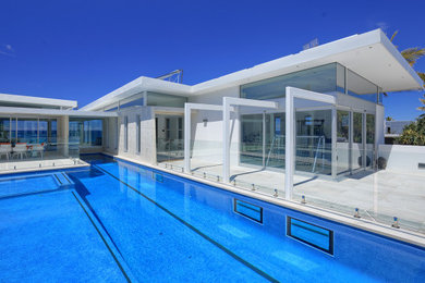 Design ideas for a contemporary pool in Sunshine Coast.