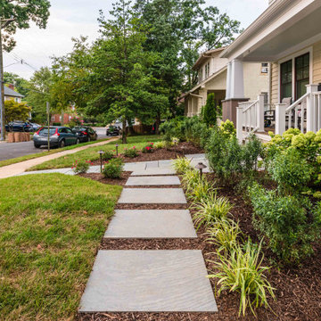 Upgraded walkway to stoop. Added stepping path to driveway.