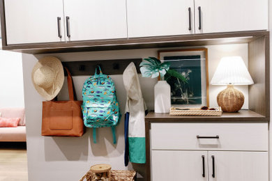 Inspiration for a mid-sized mudroom remodel in Hawaii