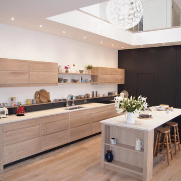 Limewashed oak and painted open plan kitchen