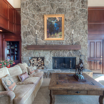 Moss Rock Fireplace with Reclaimed Rustic Oak Mantel