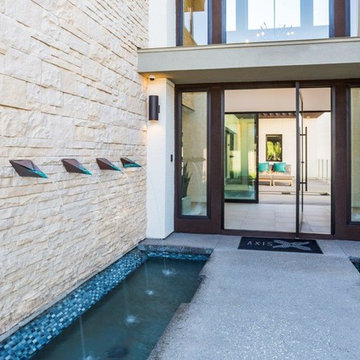 Angular Contemporary Facade With Natural Looking Stone