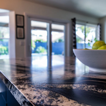 Matte Ivory Kitchen Remodel with Leathered Granite in Ahwautukee, AZ